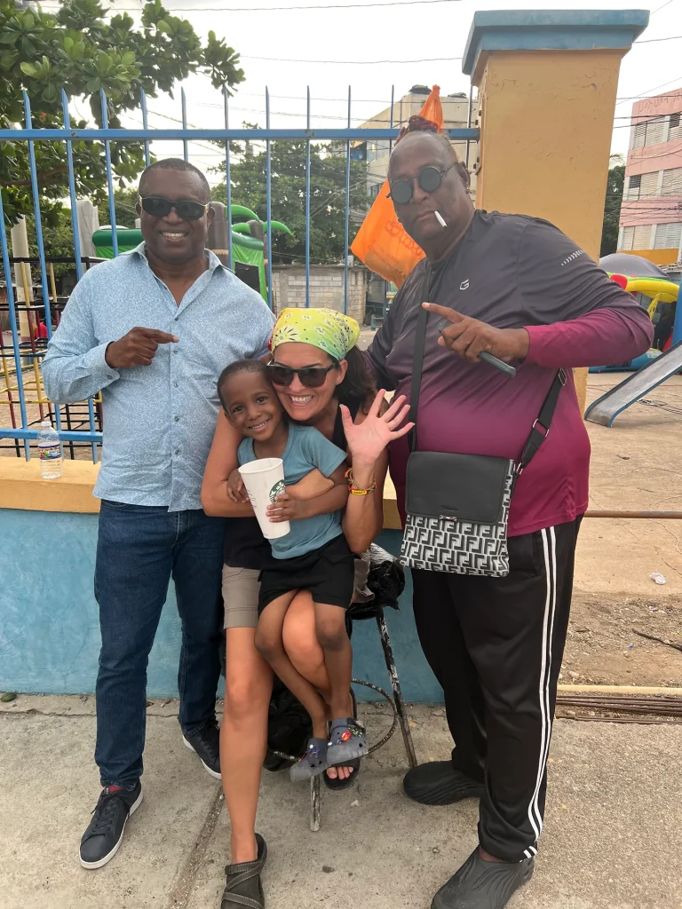 Community members together during the Chuchu Benz Foundation Give Back in Trench Town, Jamaica